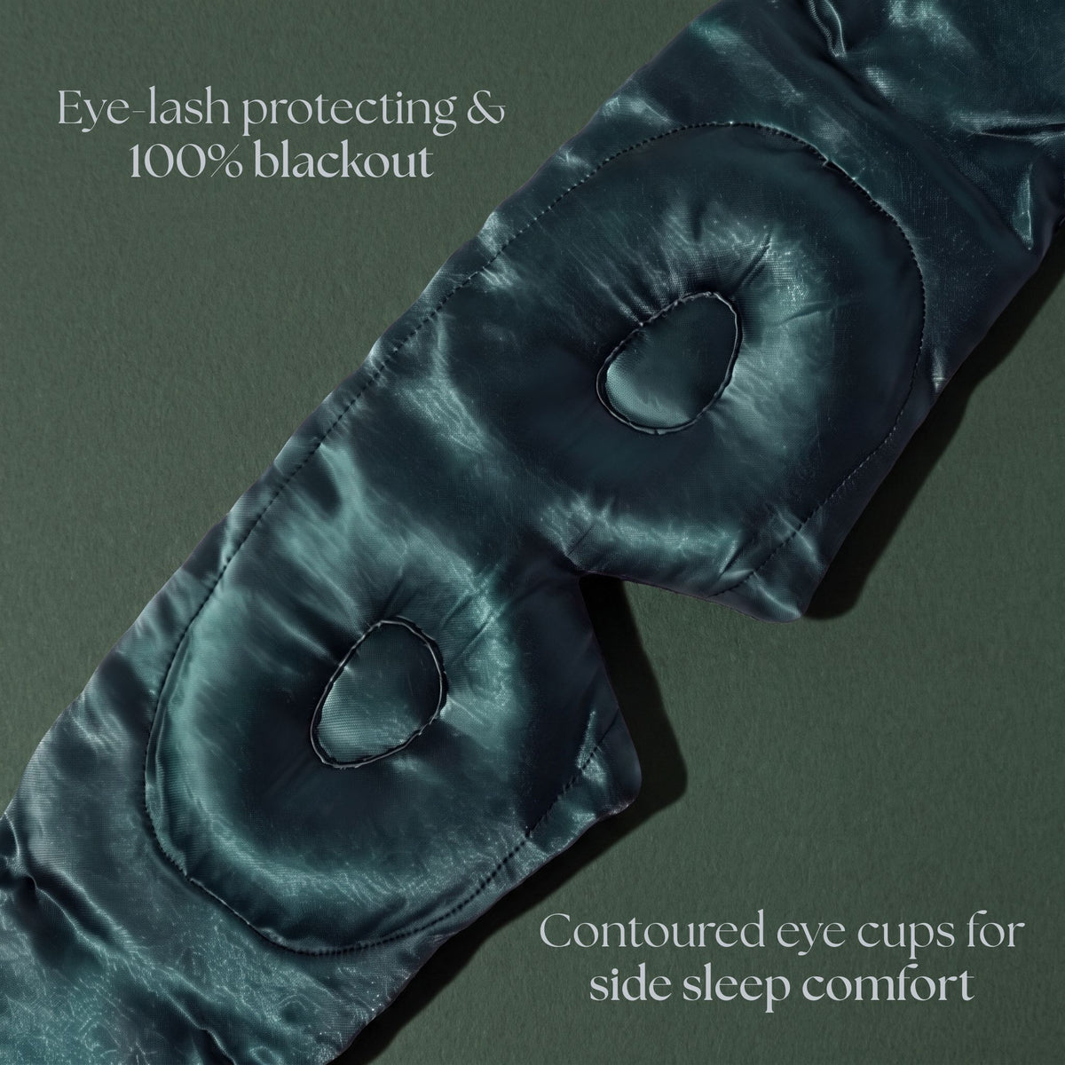 Emerald Green RYVENA mask photographed flat, moulded cups holding clear of the eyes