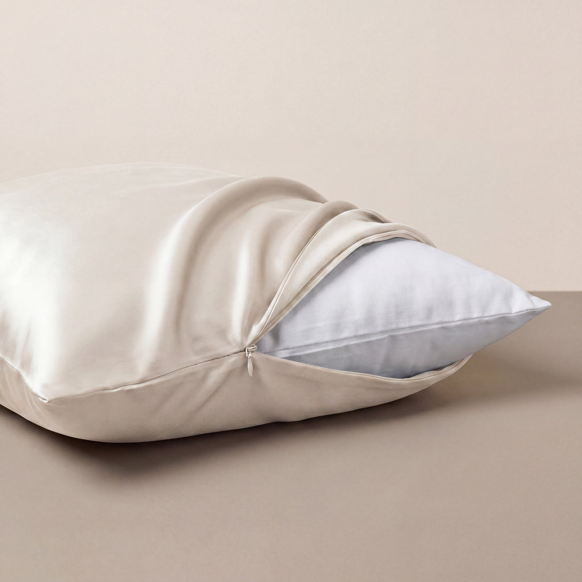 Ivory White RYVENA silk pillowcase, close view of the closure