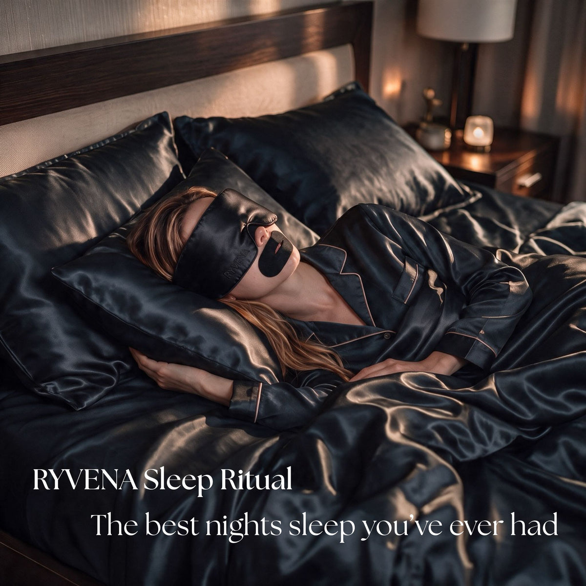 Charcoal silk bed at night, Deep Black RYVENA mask and matching mouth tape worn #Mask Colour_Deep Black