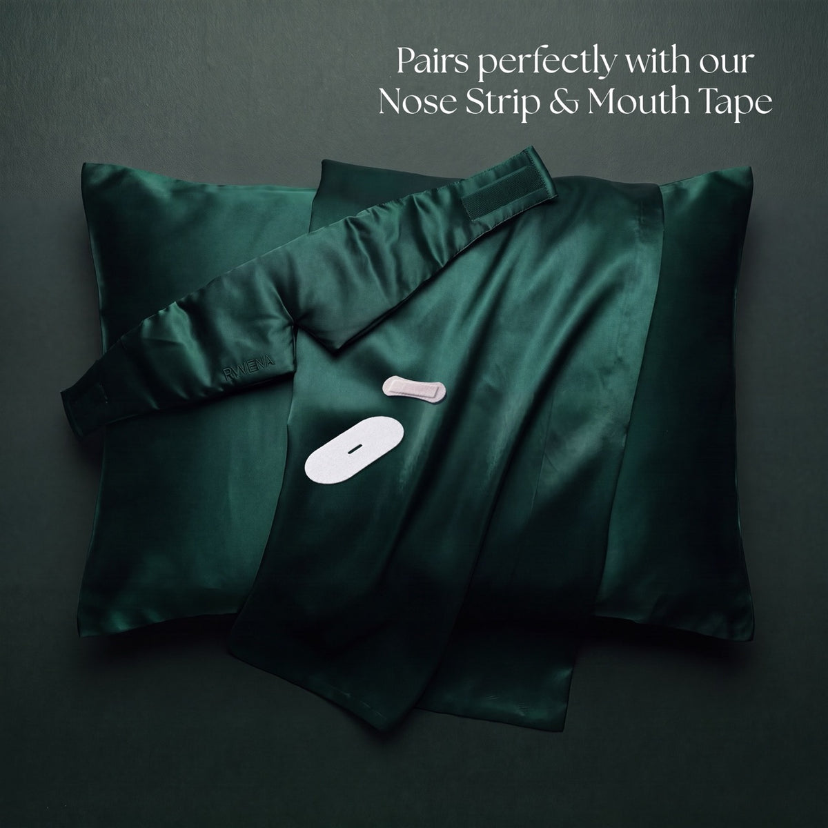 Emerald silk pillowcases paired with a white RYVENA nose strip and mouth tape