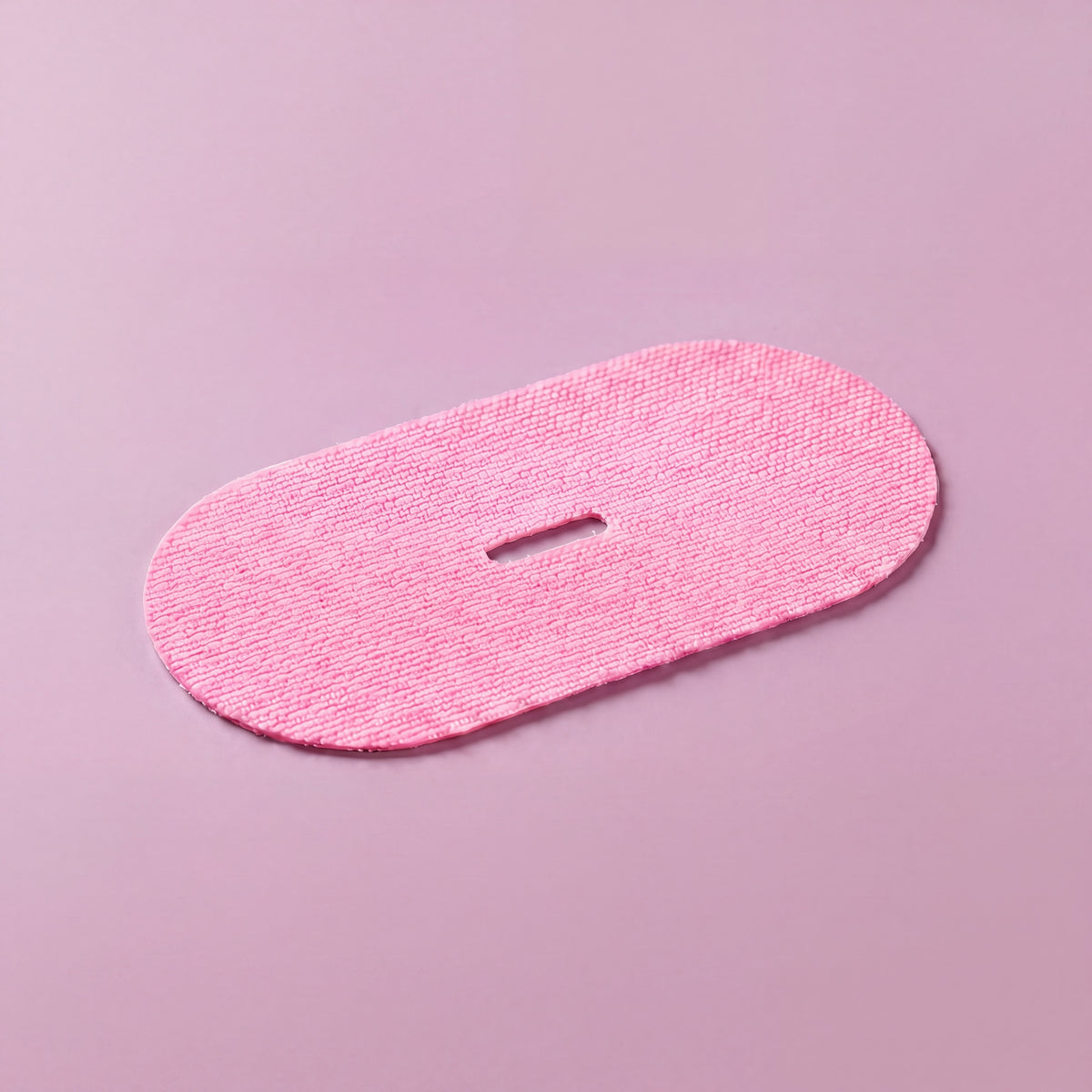 RYVENA pink mouth tape on a surface
