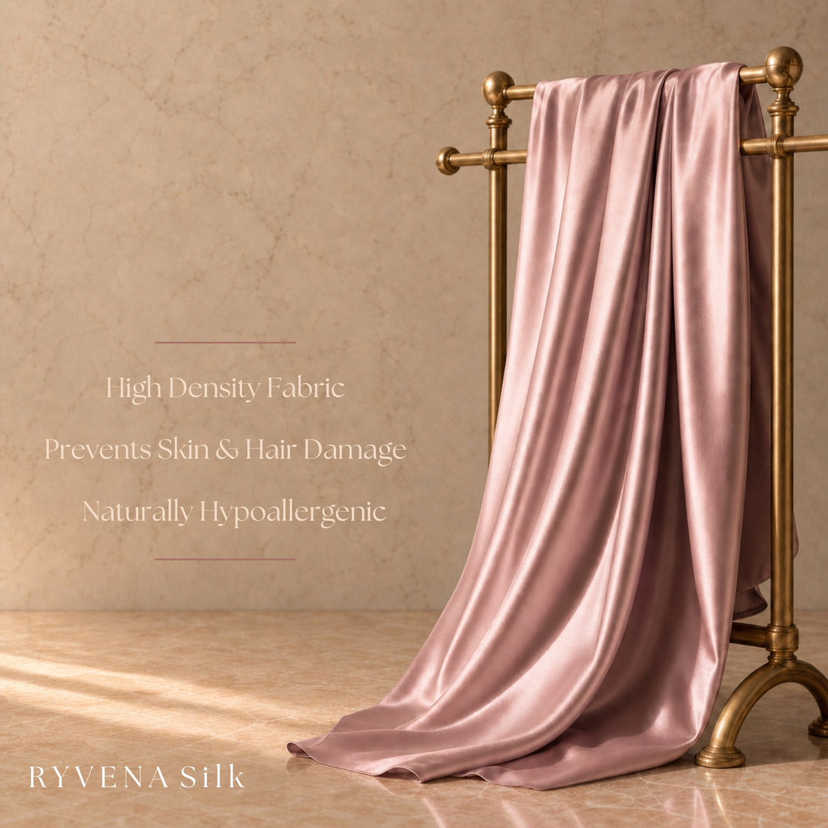 RYVENA blush pink silk draped on a rack